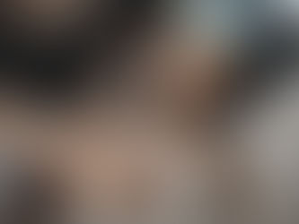 Young child with fever lying in bed, cared for by a parent using a cold compress and thermometer, illustrating the impact of illness in young children.