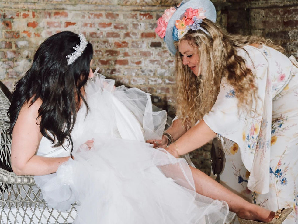 Jeska, Owner of The Bridal Boutique of Jules Walmer Deal Kent with Bride