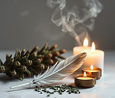 sage and smoke for energy clearing, feather and candles.jpg