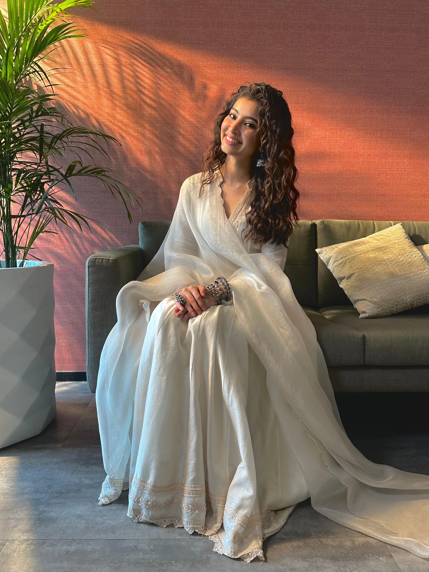 Sara Arjun in Shilpsutra off-white Anarkali set smiling close up silver jewellery