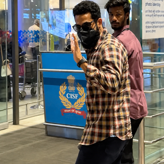 Jr NTR brown check shirt close-up airport Paul Smith