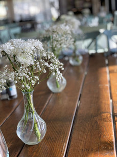 better shot of a table with some flowers
