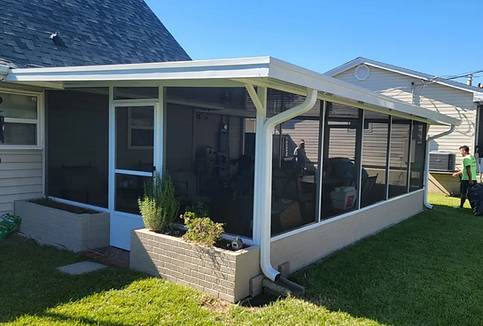 Caz Gutters and Patios-Screened in sunroom.png