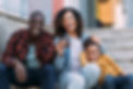 black fam in front of housing.jpg