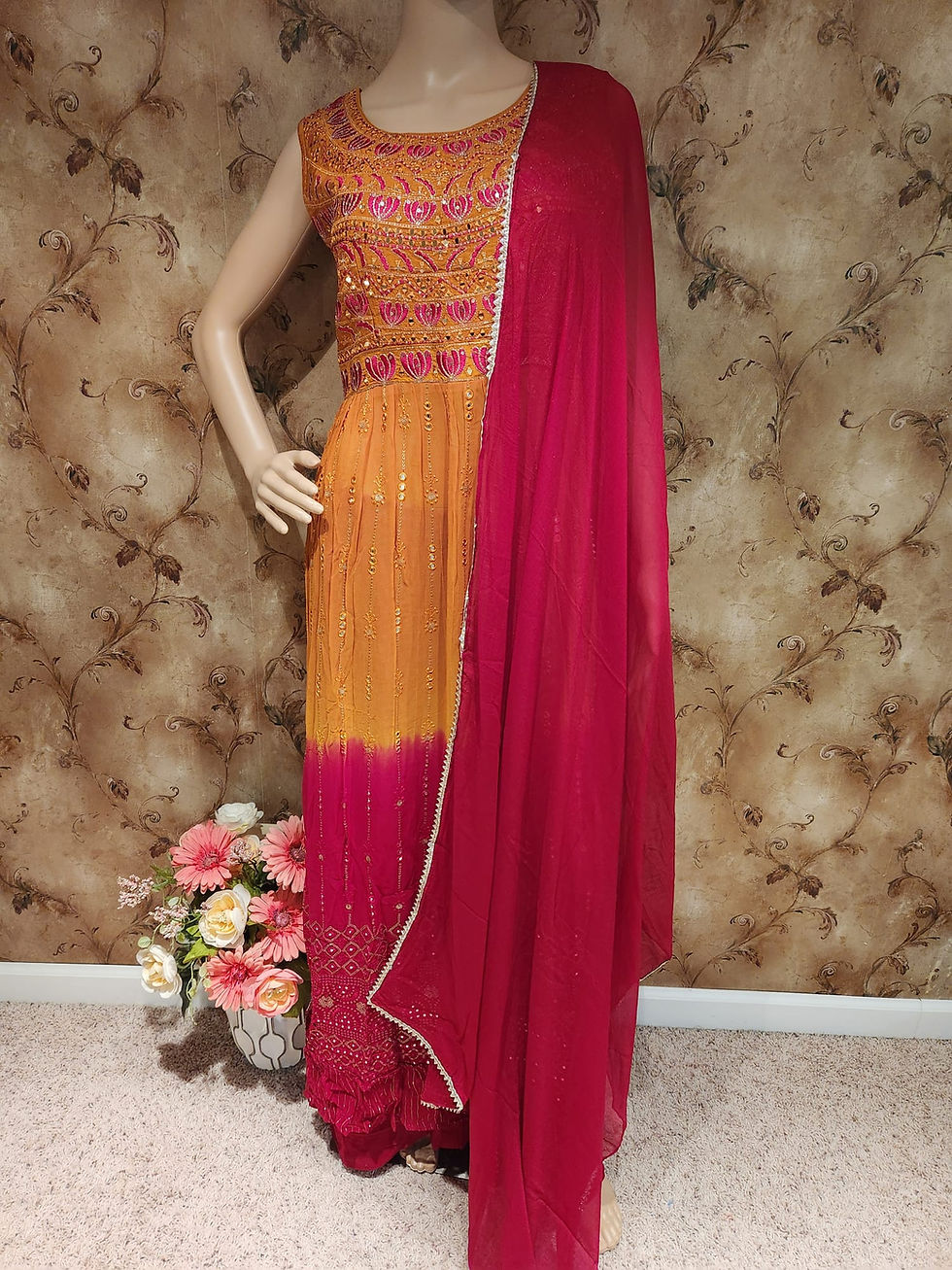 Thumbnail: Designer Georgette Nayra cut dress