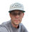Thumbnail: Front view of real man in The Establishment hat from Easylivin. Two toned color scheme of white  and black with black text. Text that says Easylivin, Columbus, Ohio. Snapback baseball style hat with a black adjustable strap.