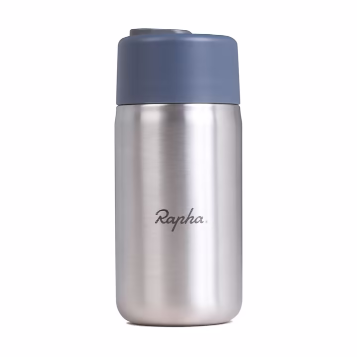 Close-up of the Black+Blum x Rapha insulated coffee cup, featuring a sleek matte finish and the Rapha logo.