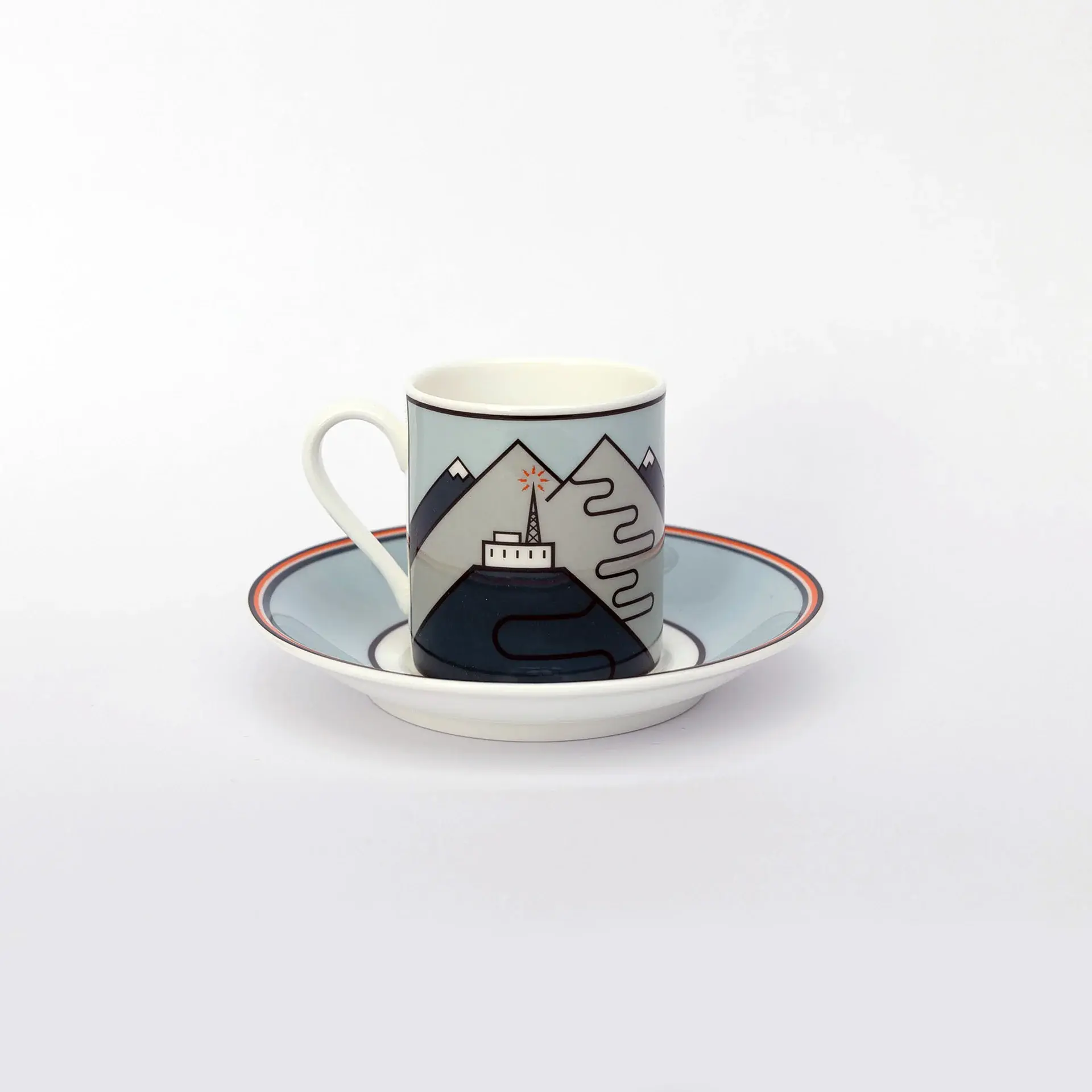 Telegraphe-Galibier fine bone china espresso cup and saucer by The Handmade Cyclist, featuring a stylish mountain pass illustration in muted blue and gray tones.