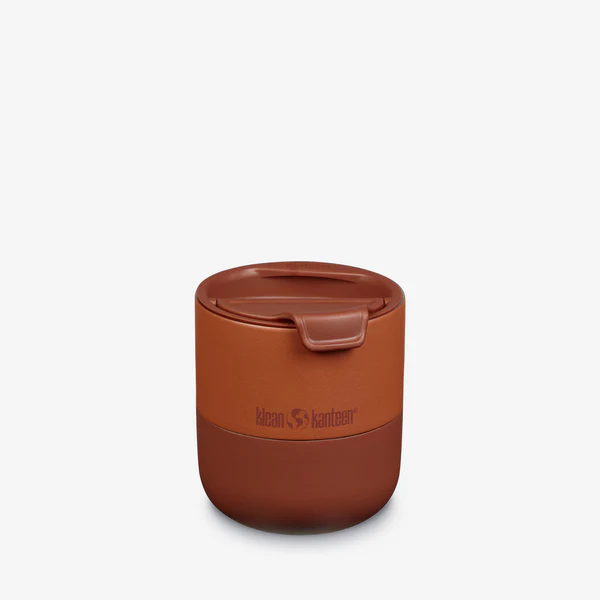 Klean Kanteen Rise Lowball Tumbler with Flip Lid in earthy orange, designed for insulation and portability.