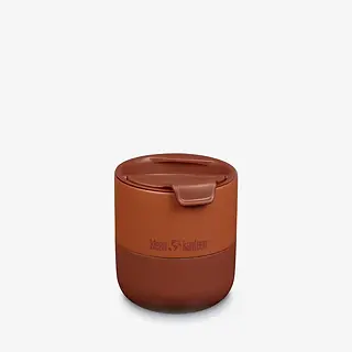 Klean Kanteen Rise Lowball Tumbler with Flip Lid in earthy orange, designed for insulation and portability.