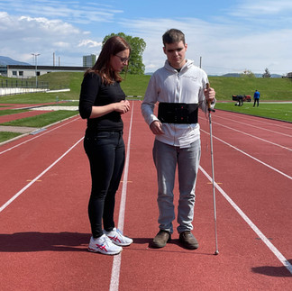 Katerina on the runway with a blind journalist and the WAIBRObelt