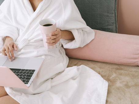 Woman in a cozy robe symbolizing comfort and self-soothing.