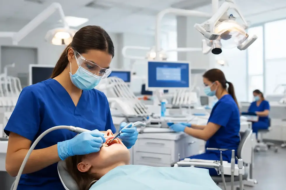 Dental hygiene student practising teeth cleaning in a simulation laboratory