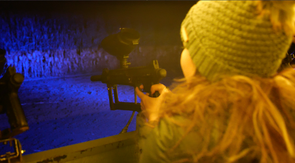 A young girl playing glow paintball at Fritzler during Fritzler Scream Acres.