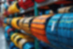 vecteezy_rows-of-colorful-electrical-cables-on-shelves_46811015.jpg