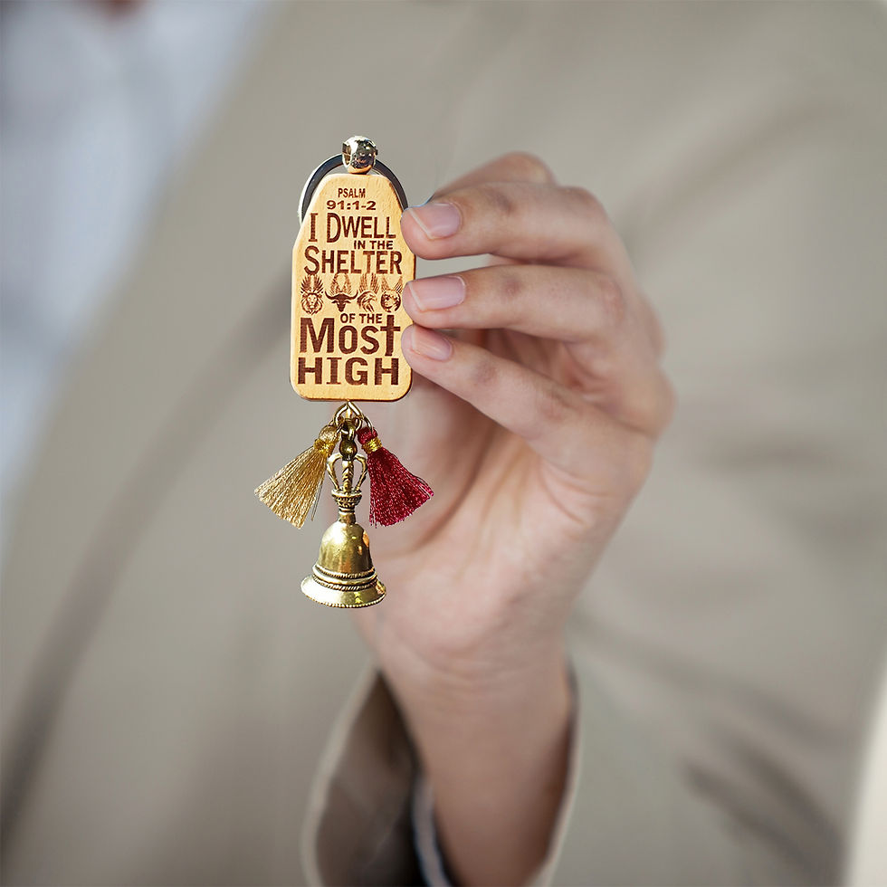 Thumbnail: Man holding a Cars and Riders Wooden Prayer Chimes with Brass Bell with tassel