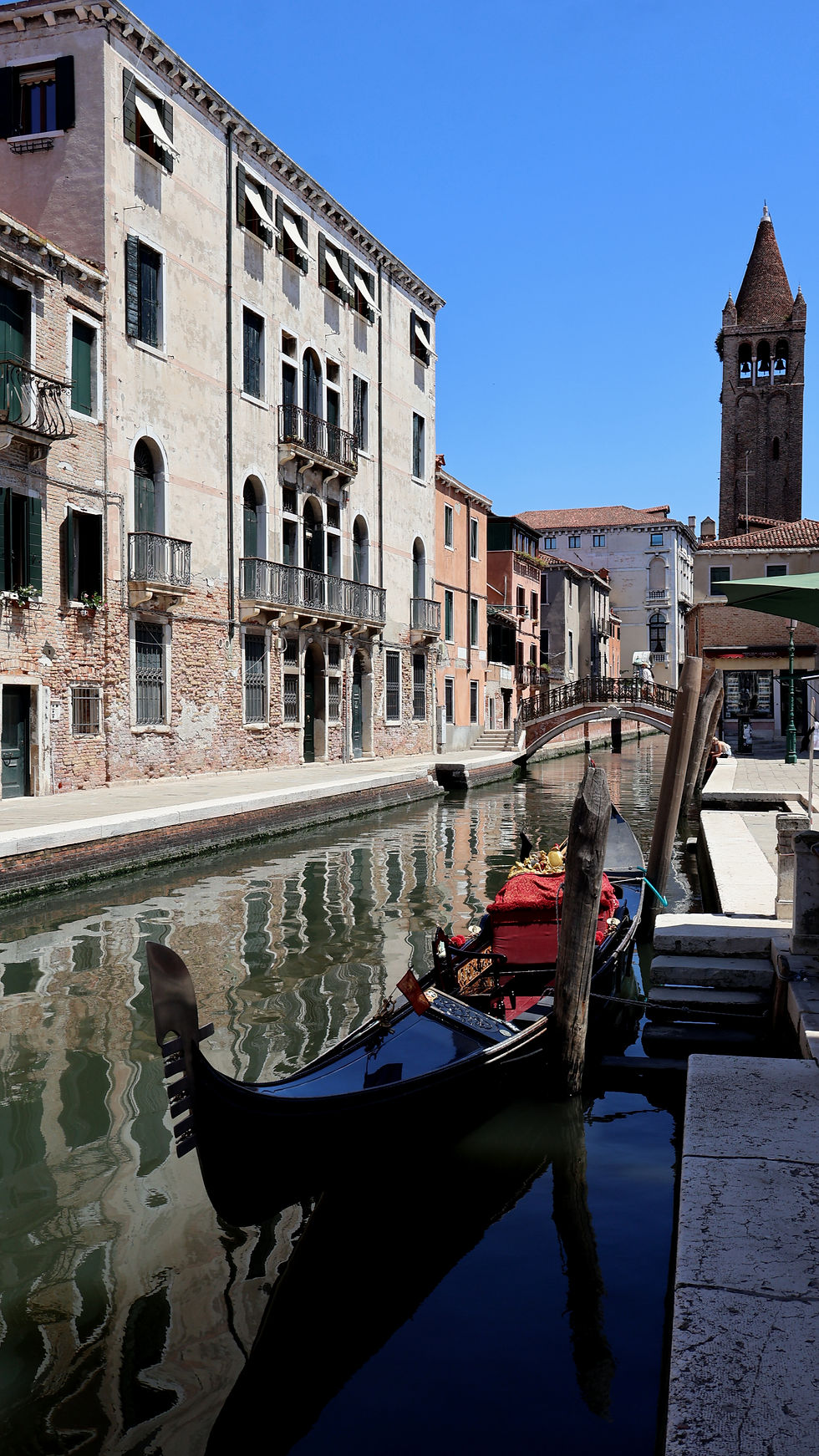 A boat gondola in the streets of Venice