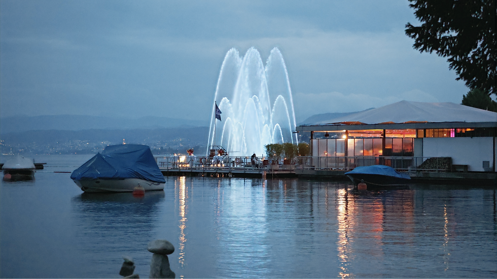 Water fountain light show on a lake