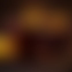 Two mulled wine drinks on a bar top