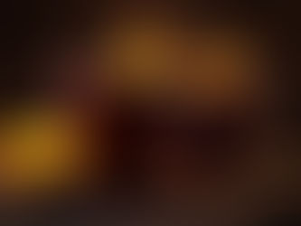 Two mulled wine drinks on a bar top