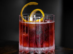 clarified milk punch cocktail on table