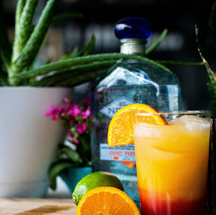 tequila sunrise cocktail on bar top