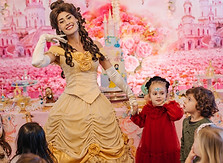 The Rose Princess posing with a little girl