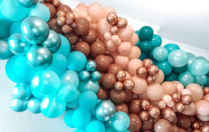 Boho neutral tan balloon garlands make balloon wall for baby shower and gender reveal (1).