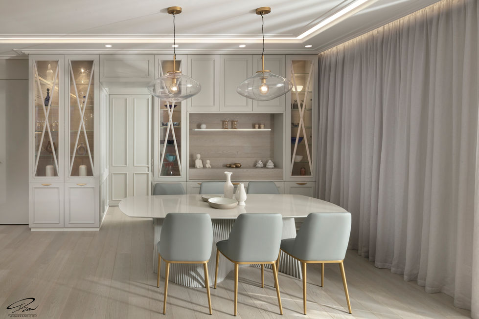 Elegant dining area with modern lighting and decor.
