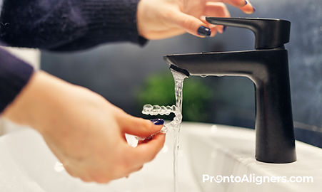 washing aligners with water after use