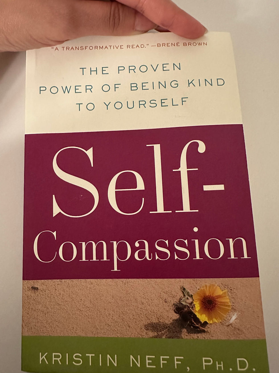 Book with title Self-Compassion - A reminder to be as kind to yourself as you are to others.❤️