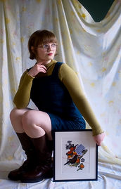 Self Portrait with art 2-2 brighter.jpg