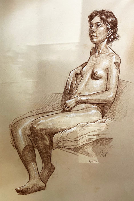 "Side View Seated Looking Ahead"