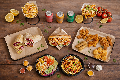 Kebab shop feast on rustic table (10MB).png