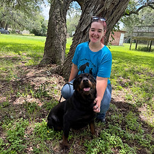 Kara with a rottweiler rescue dog.