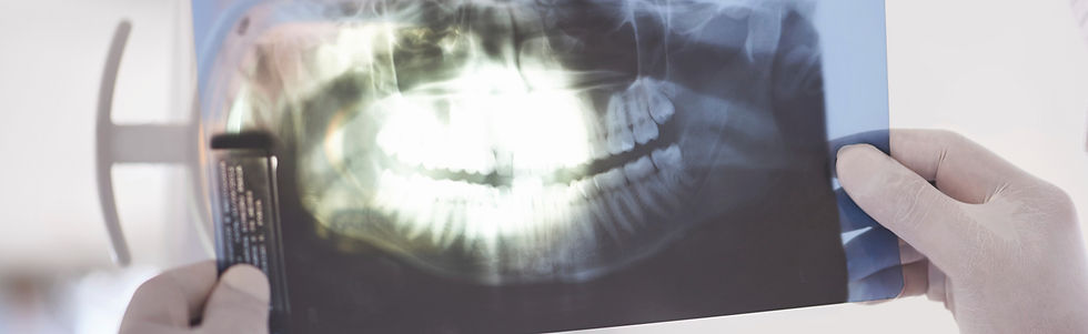 Dentist Reviewing X-Ray_edited.jpg