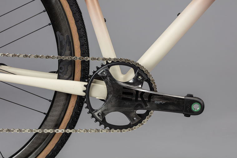 Road bike photography by Simon Eldon, Campagnolo crankset detail on cream gravel bike frame
