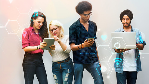diverse-friends-using-digital-devices.jpg