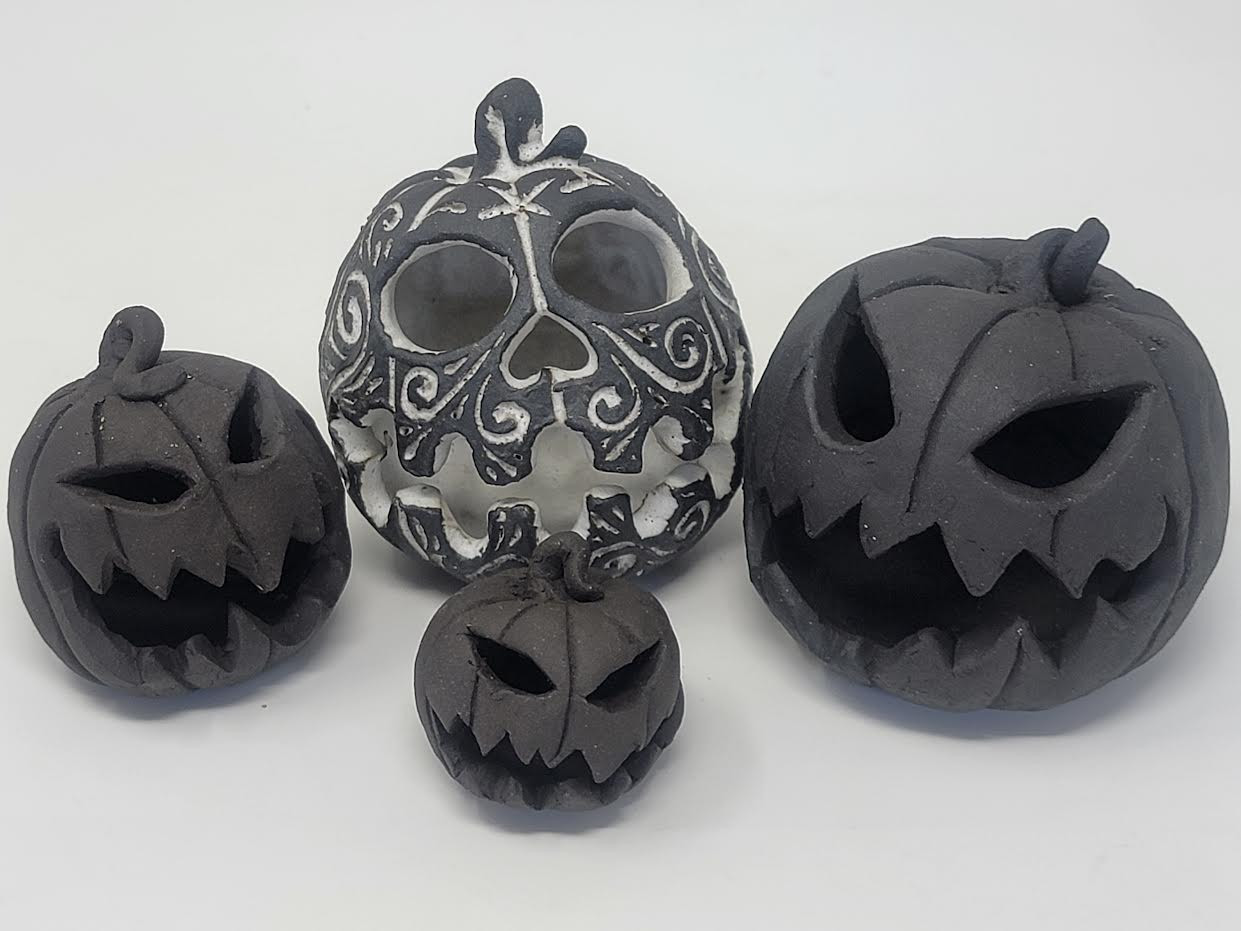 Raw clay black pumpkins