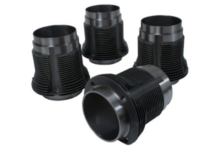 Four black air-cooled engine cylinders