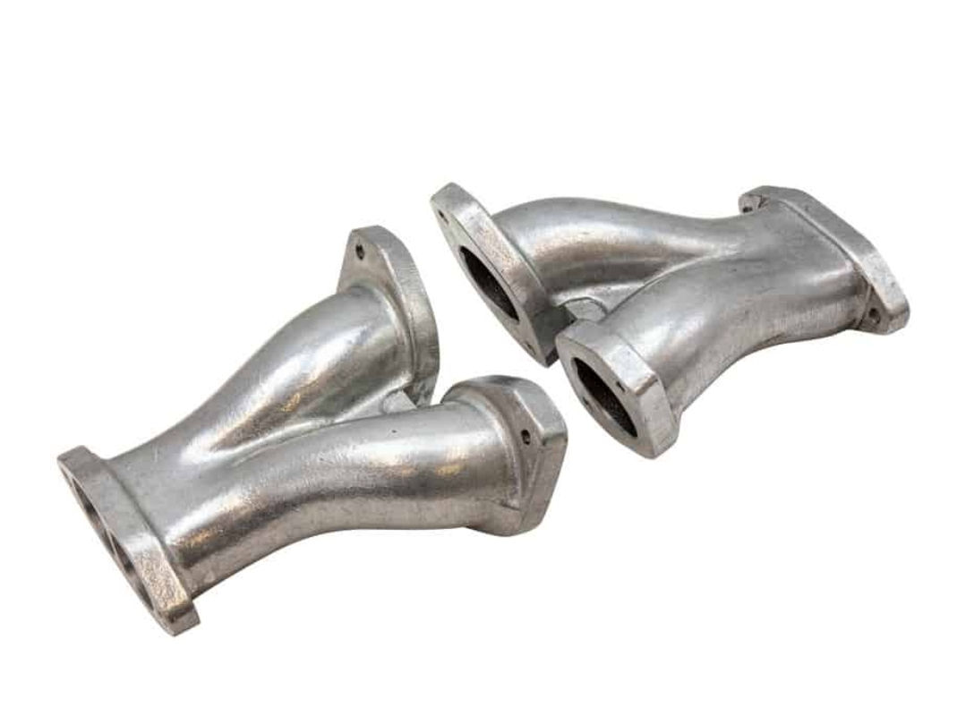 Pair of polished aluminum exhaust manifolds