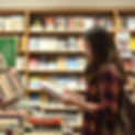 a person buying a book at a book store.jpg