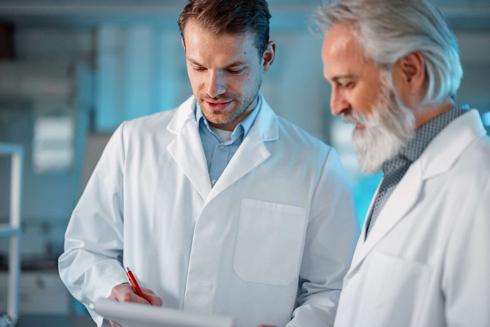 Life sciences auditor reviewing GxP validation documents during inspection.