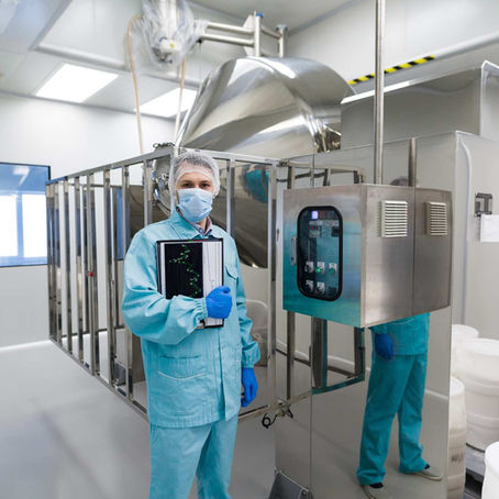 Life sciences team implementing GxP quality assurance practices across manufacturing and research.