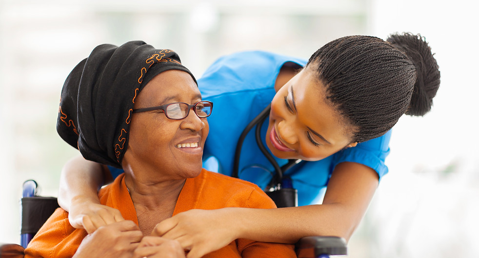 happy senior patient with friendly femal