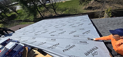 Two person doing roofing construction