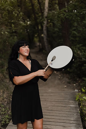 A Shaman with her drum by the Boise River. She is a Shaman in Boise, Idaho.