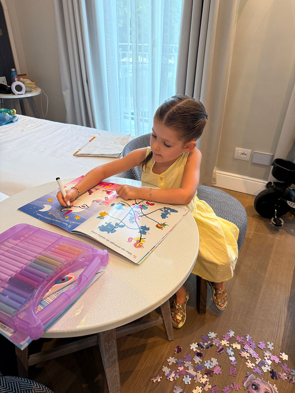 playing with her toys we had the hotel help us purchase