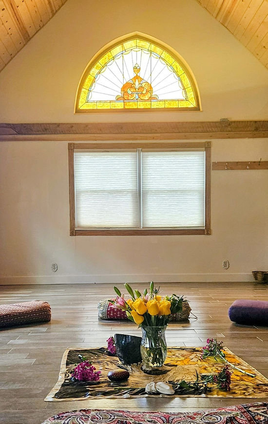 Bolsters, flowers, and stainglass window