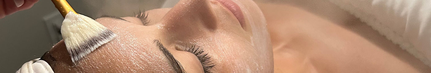woman pictured having a relaxing facial